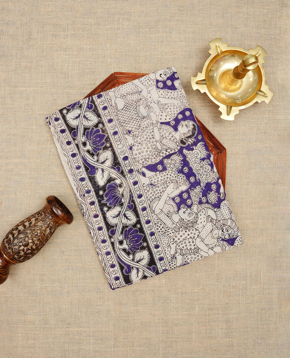 Cream & Purple colour kalamkari cotton saree featuring kalamkari printed body &  pallu, paired with a matching  contrast blouse piece.