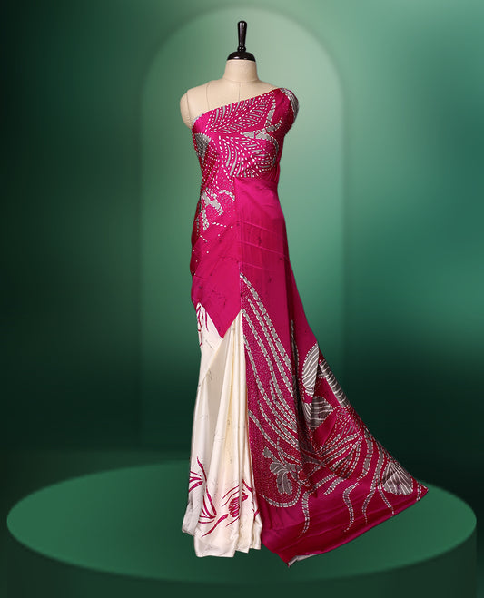Pink and Off White colour semi modal saree featuring contemporary abstract and floral patterns highlighted with shimmering accents, complemented with a coordinated blouse