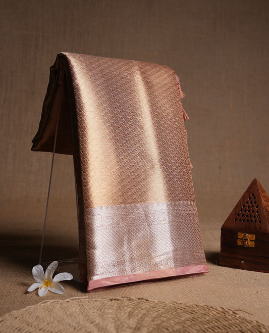 Dark Gold colour Pure banaras tissue silk saree featuring gold zari brocade design across body, with contrast pink colour with silver zari brocade border, finished with a matching blouse.
