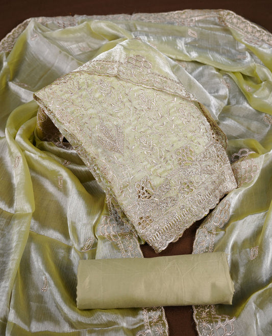 Powder green colour churidar set with stone and thread embroidery and detailing, paired with matching pant and dupatta.