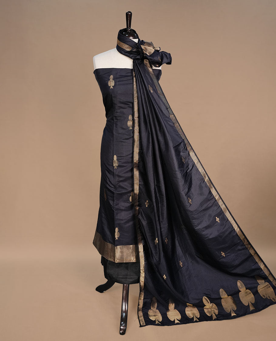 Black colour churidar material featuring gold zari card pattern on body, border, paired with matching bottom and dupatta.