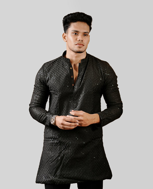 Black colour men's kurta featuring elegant thread and sequins work on the body, complemented by full sleeves for a refined and festive look.