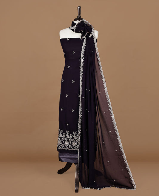 Violet colour churidhar material featuring gold thread floral pattern on body, paired with matching bottom & dupatta.