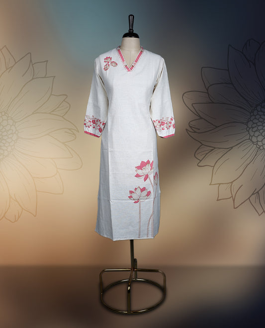 Off white colour kurthi with delicate pinkish peach floral embroidery on the neckline, sleeves, and hem, Featuring a stylish V neck and three quarter sleeves, perfect for a graceful and comfortable look.
