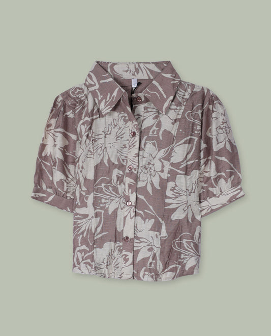Dusty mauve floral printed shirt top with collared neckline, front button placket, short cuffed sleeves, and soft gathers at the shoulders.