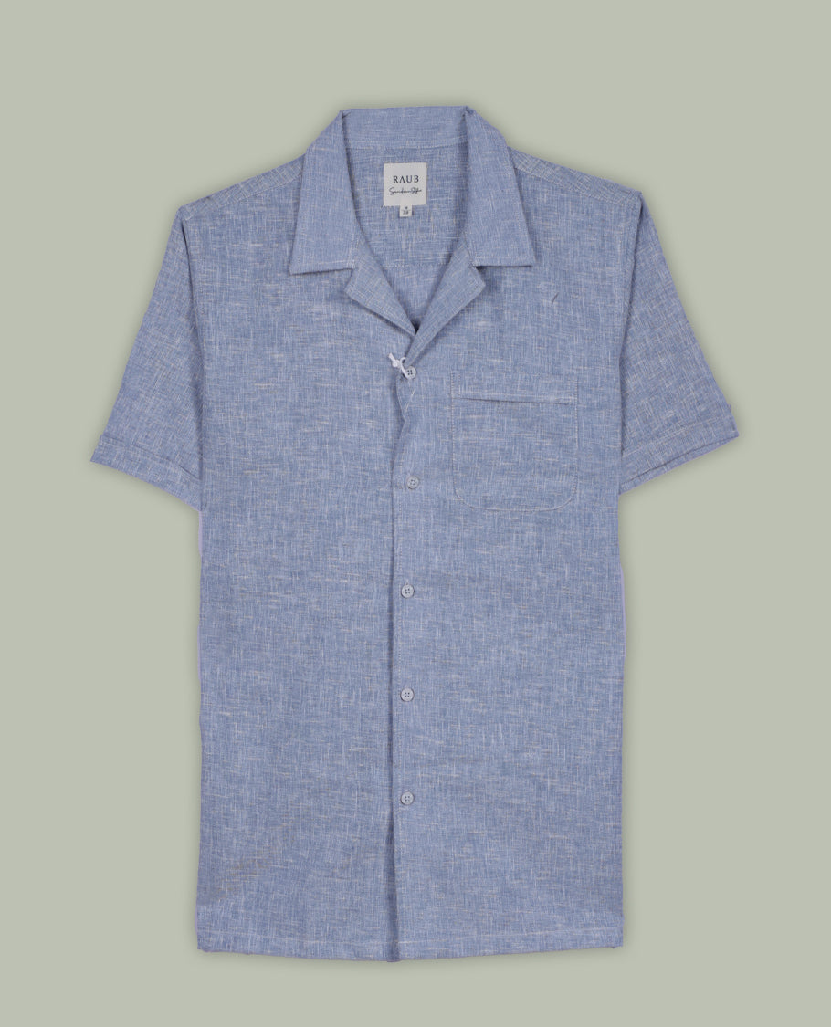 Pastel blue colour short sleeve shirt in a lightweight cotton linen blend, designed with a laid-back Cuban collar and chest pocket , it perfect for breezy, casual days.