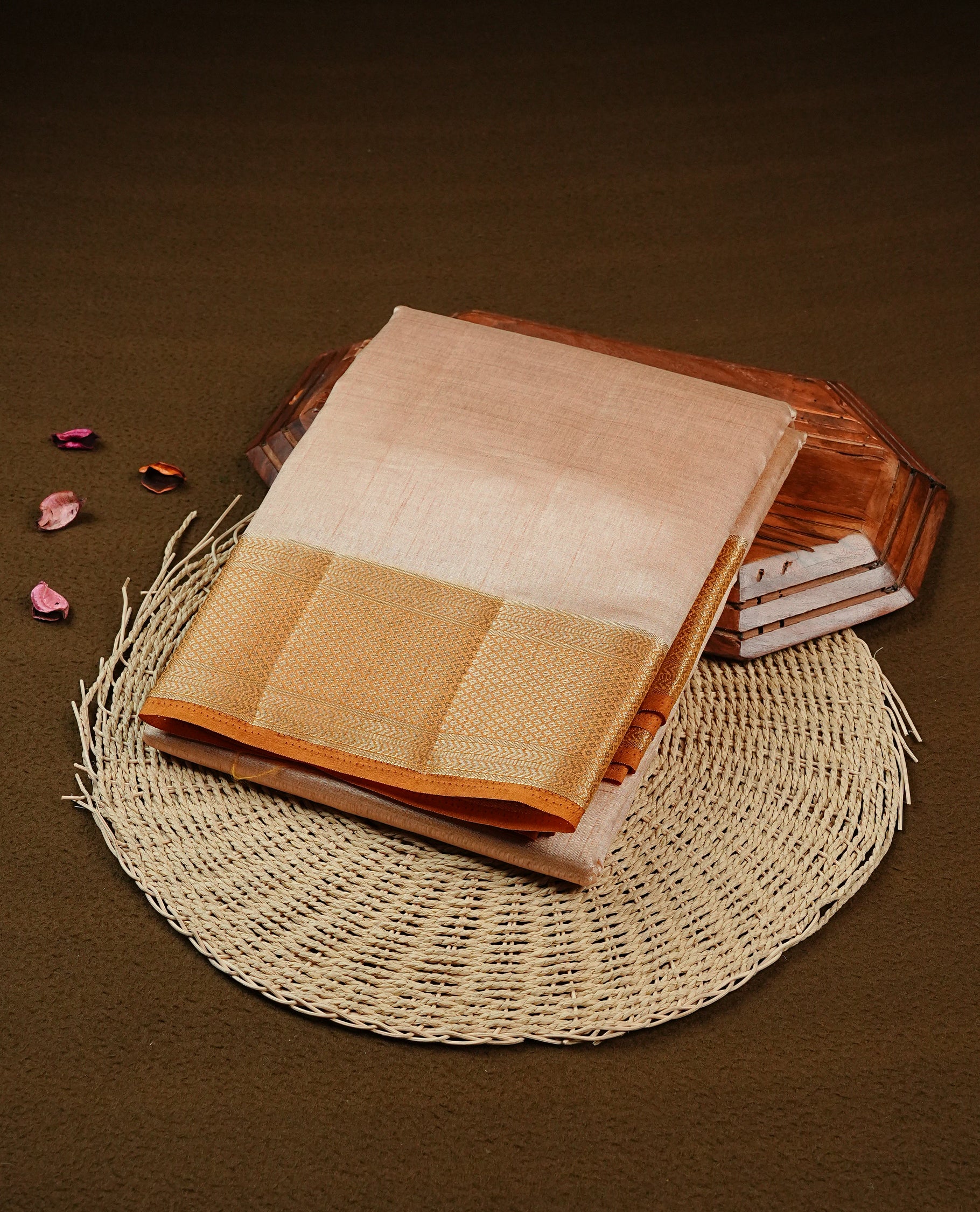 Light Gold Tussar saree featuring Gold zari buttas on body, complemented by contrast Mustard Colour with Gold zari border, comes with matching blouse piece.