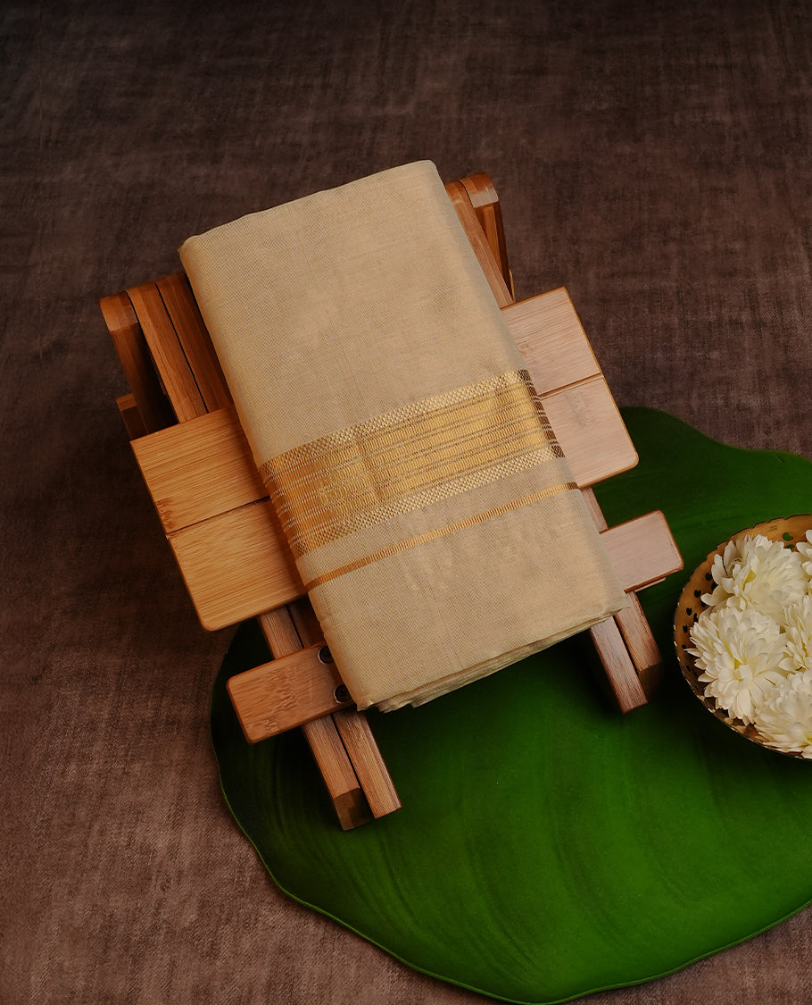 Cream colour tissue Double dhoti featuring plain with Gold zari kara.