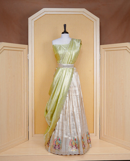 Light gold & Light Green Semi Stitched Dhavani Set Light Gold Skirt With Floral Pattern & Stone Worked Border, Paired with Unstitched Blouse, Elegant Dupatta For Prefect look.