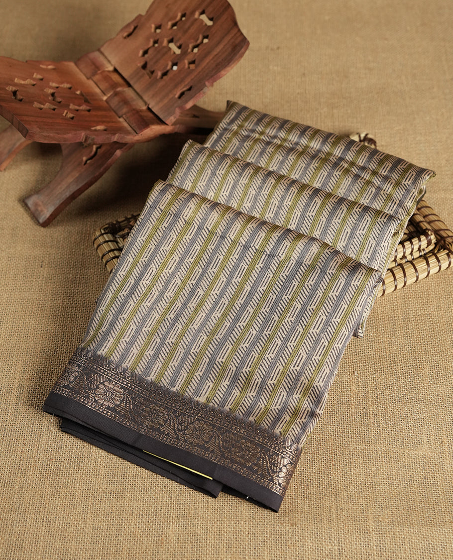 Cream colour chanderi silk saree with ash & olive geometric stripped printed On body, compilmented by contrast Dark ash colour border with golden zari floral pattern and a matching blouse.