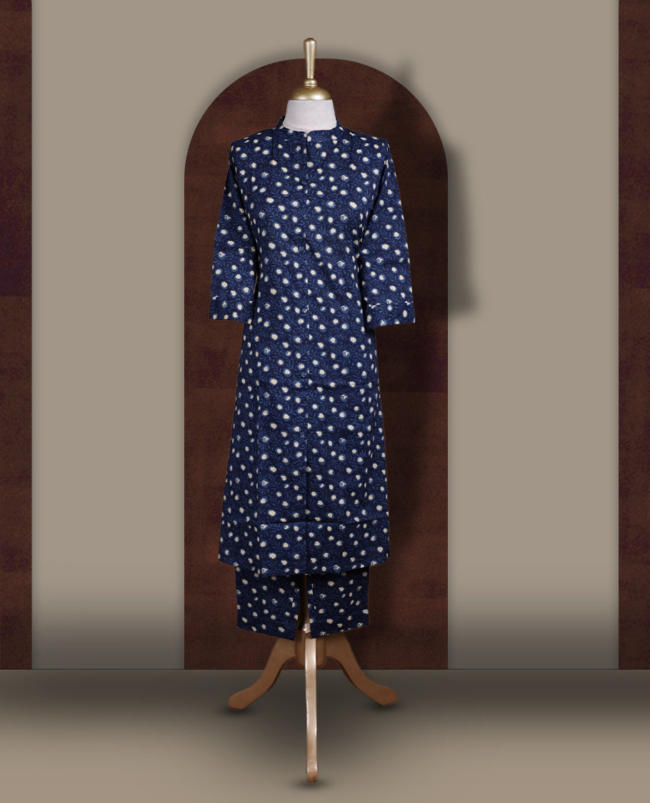 Navy blue colour coord set with beige prints all over, featuring a smart mandarin collar and 3/4 sleeves, Paired with matching straight pants, this set blends comfort and elegance for a stylish everyday look.