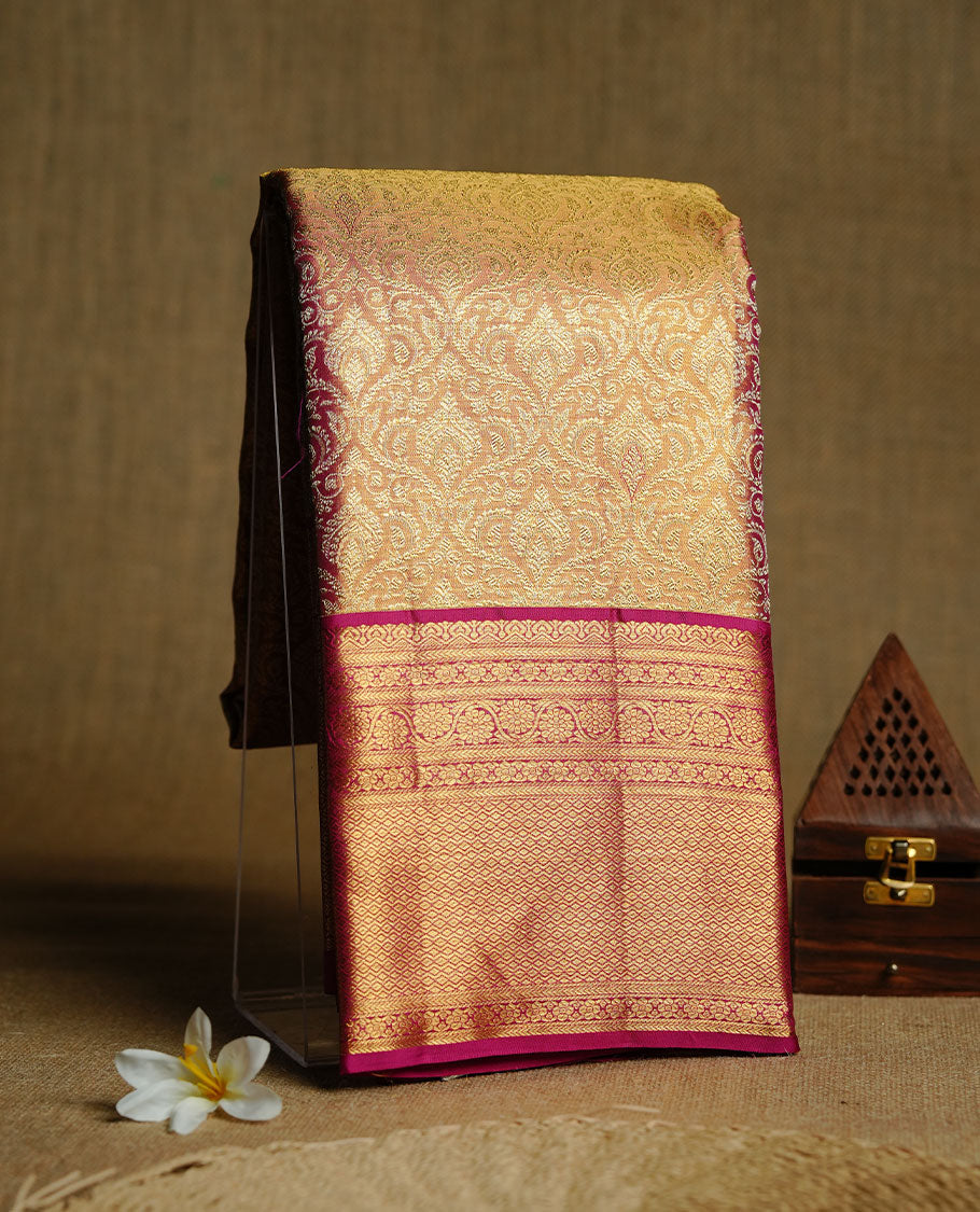 Gold & Magenta double shade colour kancheepuram tissue silk saree featuring gold zari floral kodi pattern on body, complemented by contrast magenta colour with traditional border, paired with matching blouse piece.