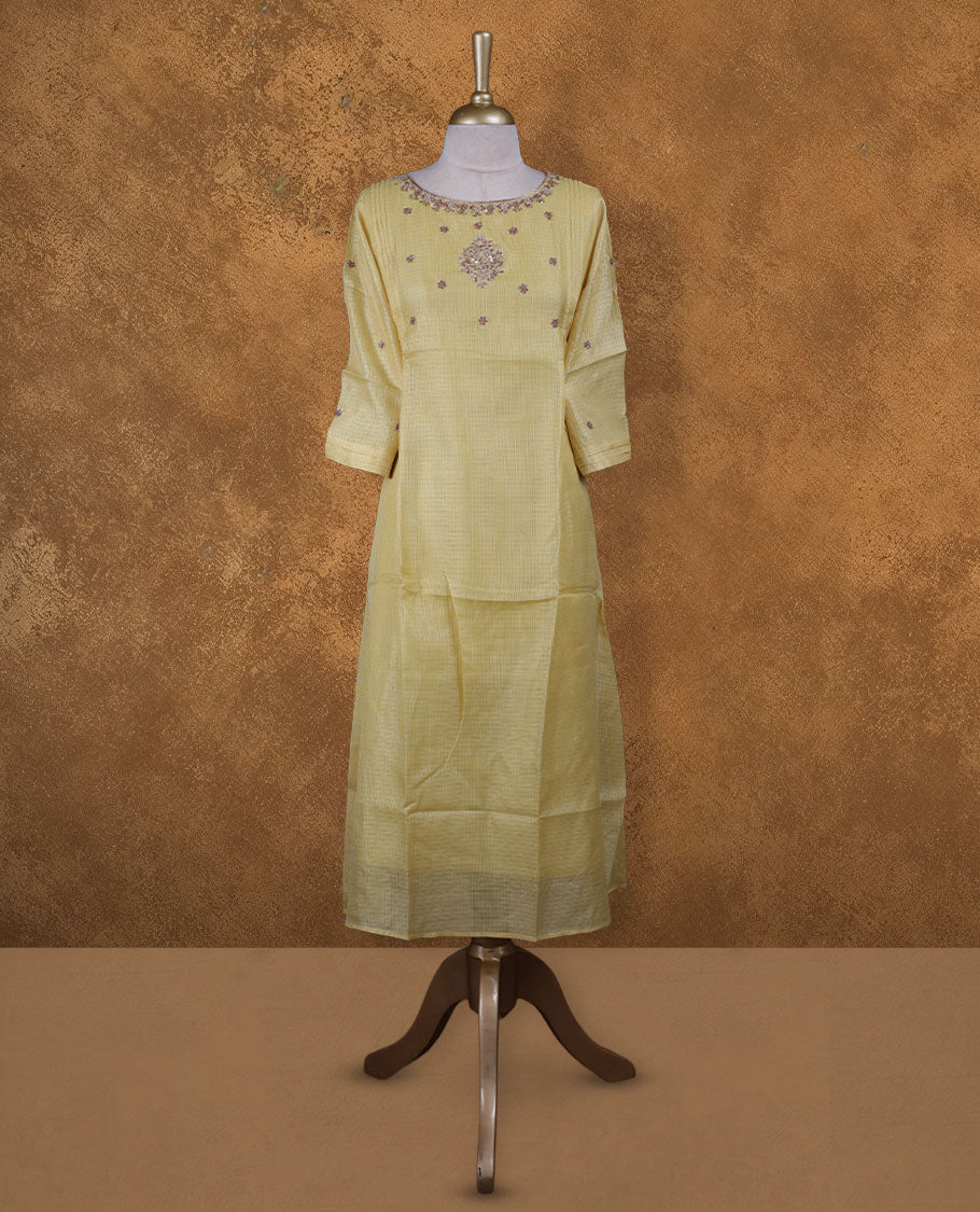 Yellow colour kurti with gold colour thread & beats floral thread pattern, knee length design, styled with a Round neckline and a  sleeve .