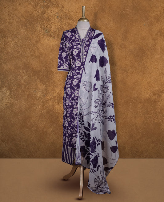 Violet colour churidar set featuring elegant white thread embroidery on the neckline, sleeves, and scattered motifs across the body, Paired with a matching embroidered dupatta