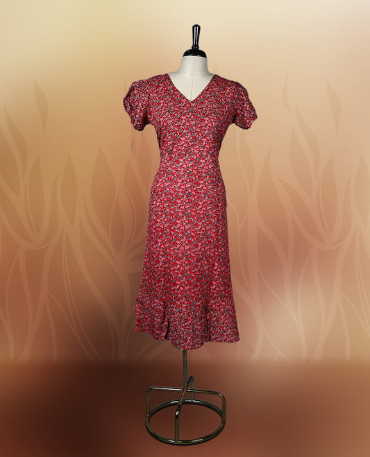 Red colour printed nightwear with floral patterns, V neckline, and short puff sleeves, Tailored for a flattering fit with a flared hem & perfect for casual outings or daily ethnic wear with comfort.