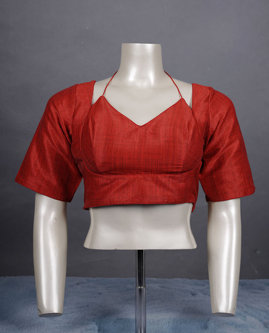 Red colour colour silk padded readymade blouse with elbow-length sleeves, a V-neck front, and a deep U-back with tie-up dori.