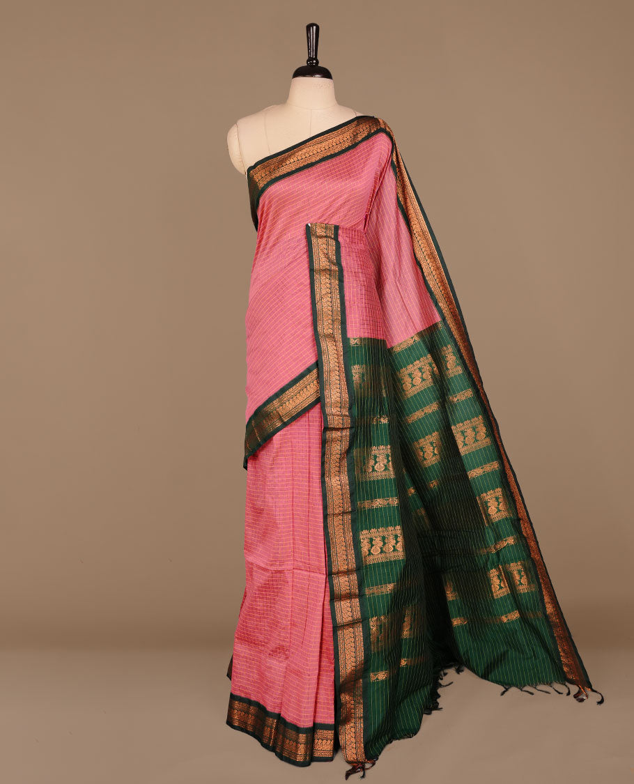 Pink colour kalyani cotton saree featuring gold zari check pattern on body, complemented by green colour with Antique zari border, paired with matching blouse piece.