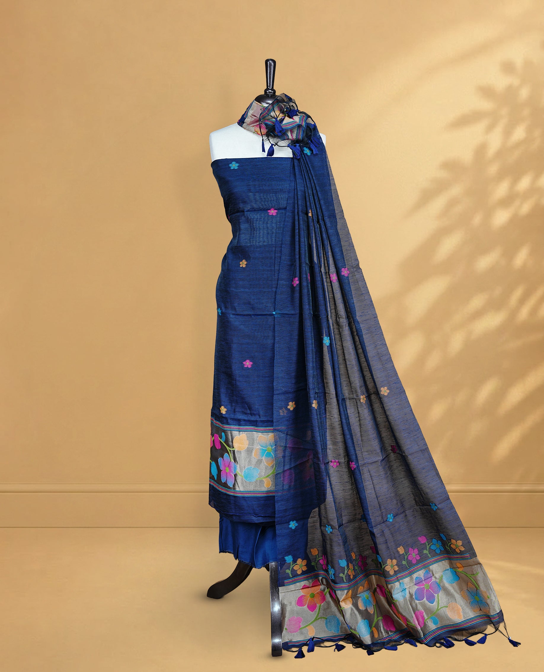 Navy Blue Colour Salwar material Featuring floral buttas & zari work on body, paired with Matching Bottom and same Patterned Dupatta.