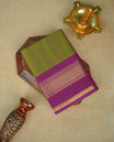 Lemon green colour chettinad cotton saree featuring elegant plain body, Contrast Magenta colour with Gold zari border, comes with matching blouse piece.
