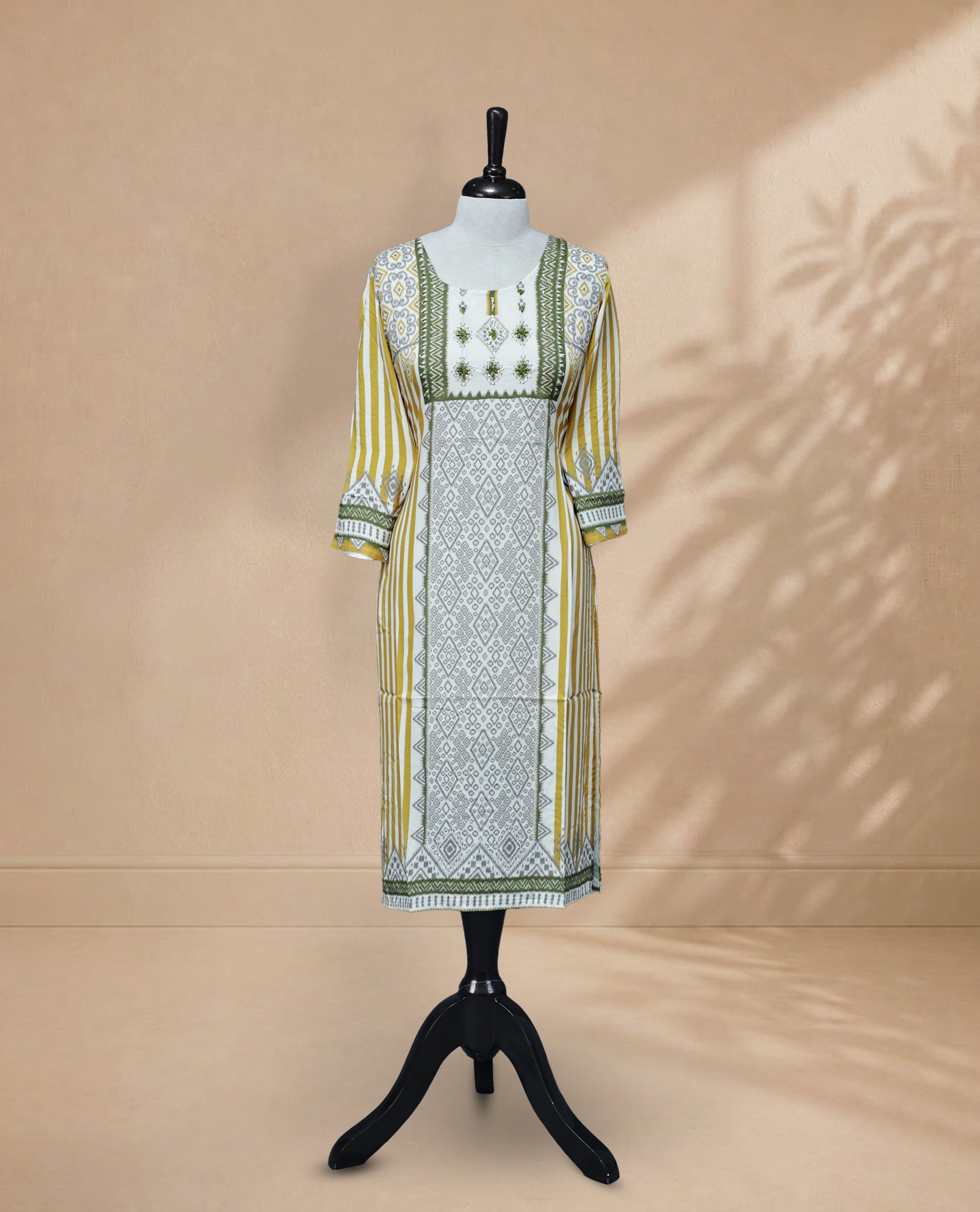 Multicolour kurti featuring a classic U-shaped neckline, intricate embroidery and sequin work on the body, and full sleeves.