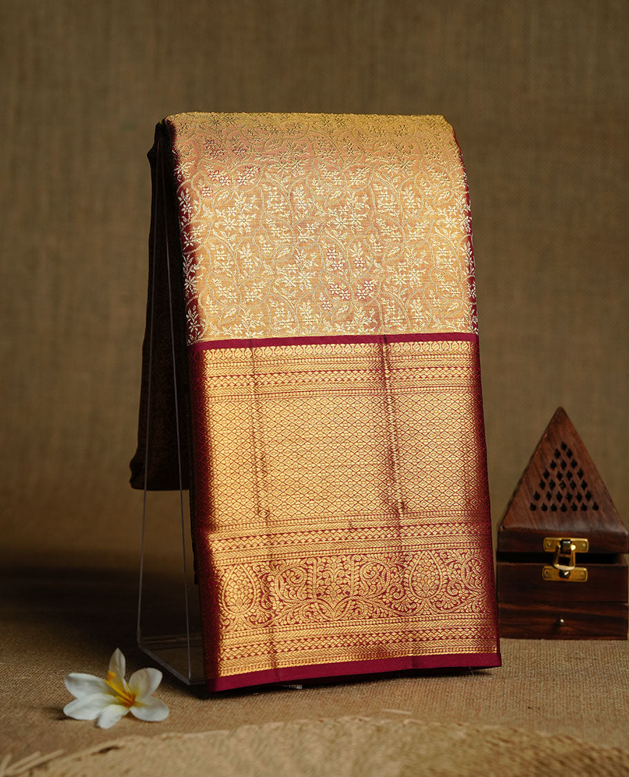 Gold & Burgundy double shade colour kancheepuram tissue silk saree featuring gold zari floral kodi pattern on body, complemented by contrast Burgundy colour with traditional border, paired with matching blouse piece.