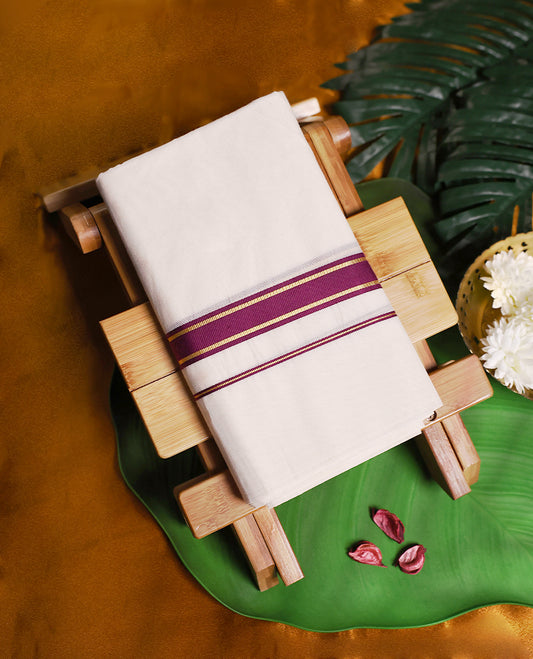 Off white colour pure cotton double dhoti featuring a dark majenta border with golden stripes & A timeless blend of tradition and style, perfect for weddings, festivals, and cultural celebrations.