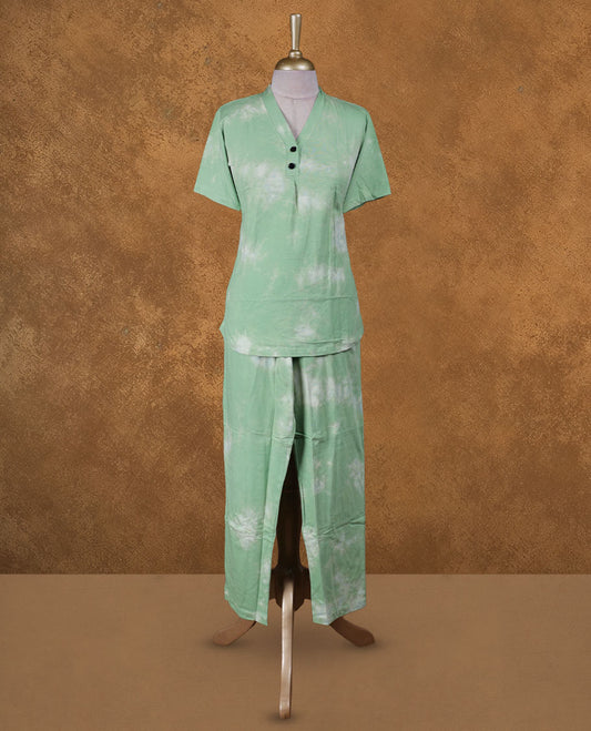 Light green colour coord set with styled with a V with botton neckline & sleeve, Dye pattern on body, , with matching bottom .