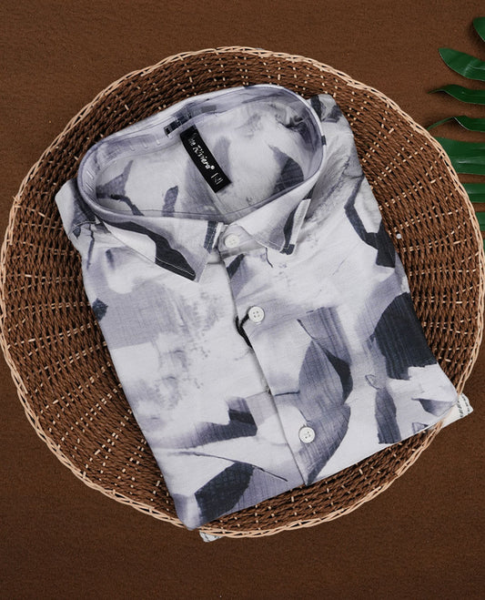 White colour shirt featuring bold green abstract brushstroke patterns, Styled with a classic collar and short sleeves, it brings a modern, artistic edge to your casual wardrobe.