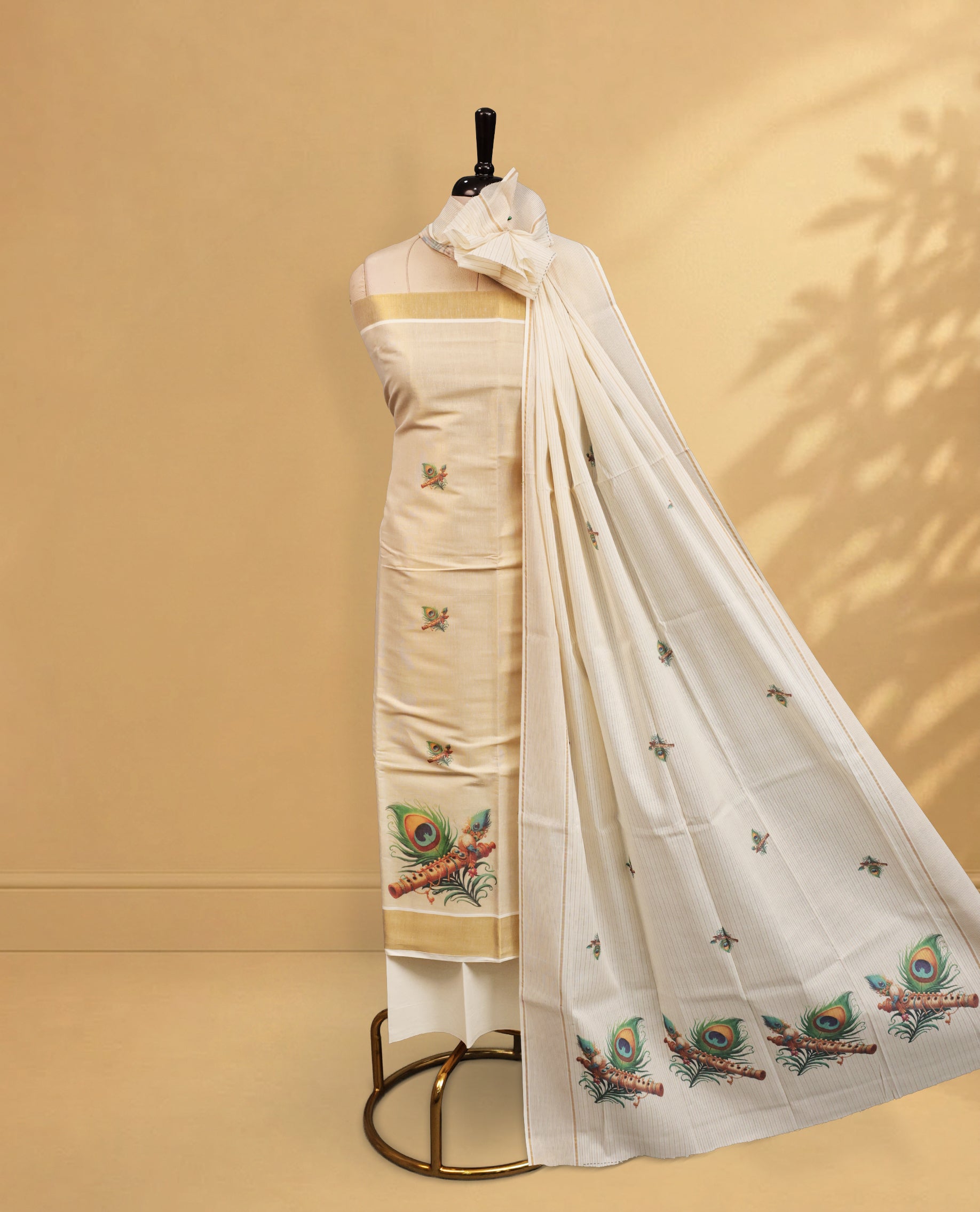 Cream Colour Tissue Salwar Material Featuring Peacock & Flute Print on body, paired with matching Bottom & Elegant Dupatta.