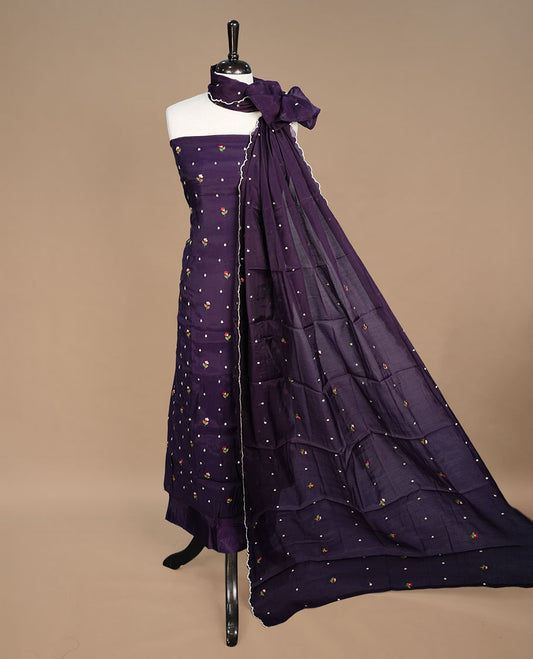 Purple colour Mulchanderi salwar suit featuring thread floral buttas on the body and matching dupatta, paired with a santon bottom.