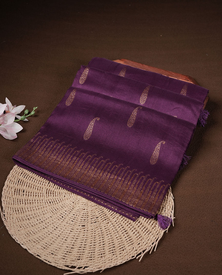 Deep  Purple colour semi banaras tussar georgette featuring gold zari leaf pattern across body, finished with gold zari border and paired with matching blouse.
