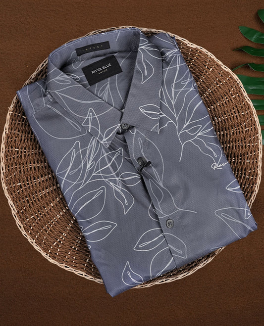 Grey colour shirt adorned with elegant white colour floral prints, Designed with a classic collar and full sleeves, this timeless piece offers a crisp and casual look, perfect for both work and weekend wear.