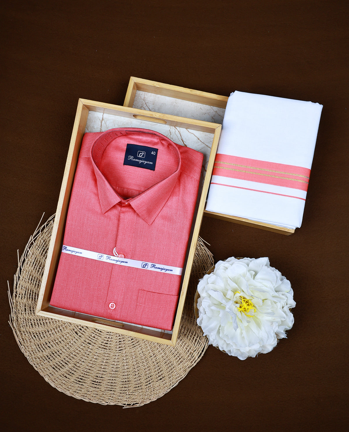 Coral pink colour RAMAJAYAM shirt paired with a matching dhoti, finishing with Coral pink & Gold kara