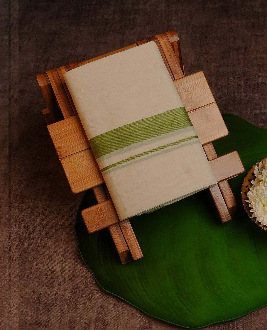 Cream Colour Cotton Double Dhoti Finished With A Classic Body , A Pista Green Kara