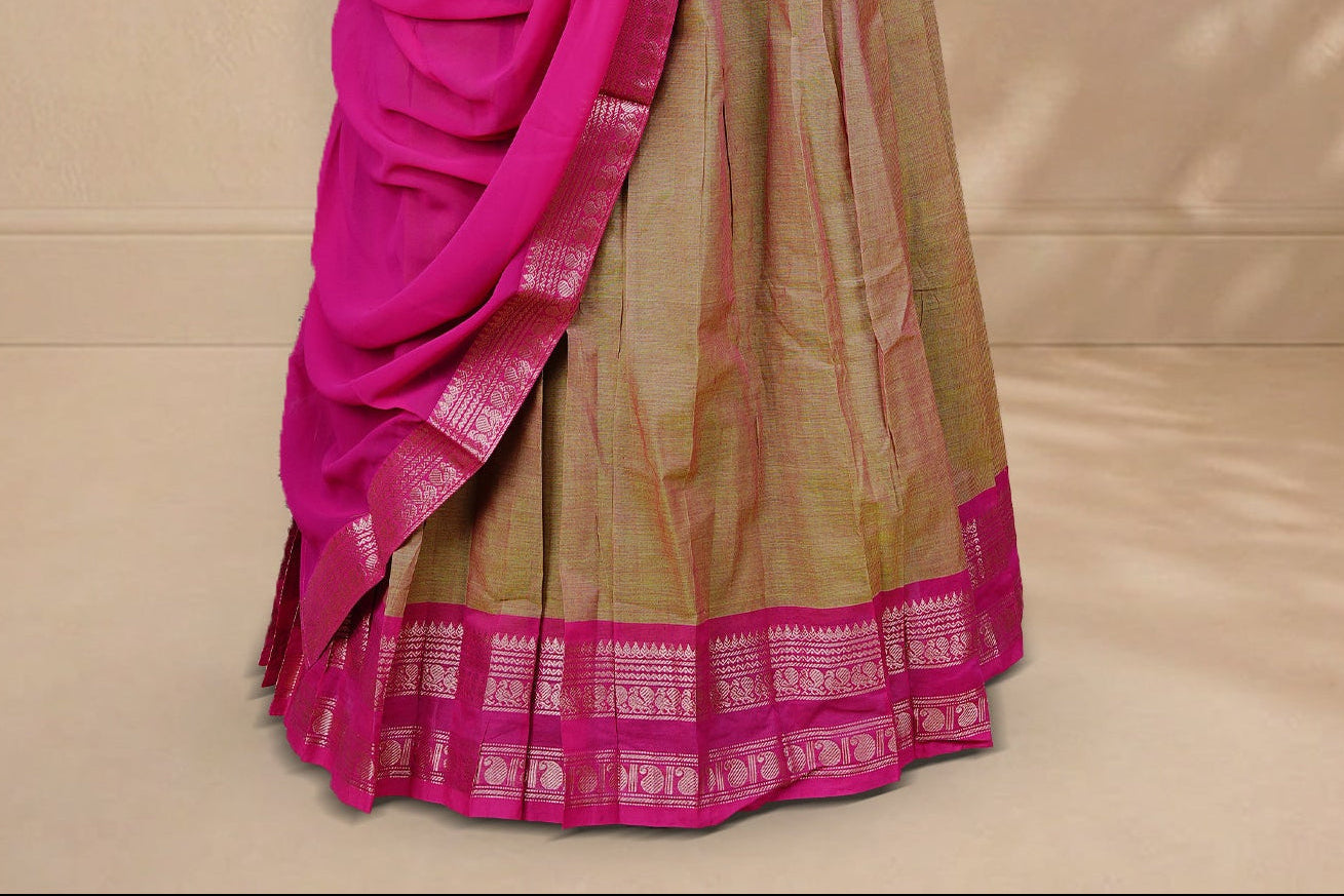 Olive & Pink double shade colour Half saree featuring Plain skirt with Zari border on contrast Pink colour border, Unstitched Blouse and matching dupatta.