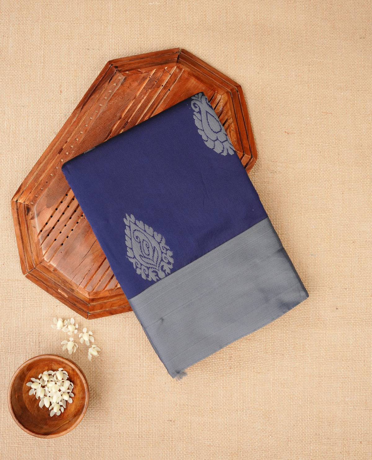Navy blue colour silk cotton saree featuring ash colour thread motifs on body thread detiled contrast borders & pallu,comes with matching blouse piece