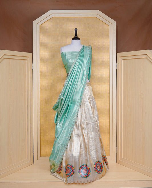 Light gold & Mint Semi Stitched Dhavani Set Light Gold Skirt With Floral Pattern With Stone Worked Border, Paired with Unstitched Blouse, Elegant Dupatta For Prefect look.