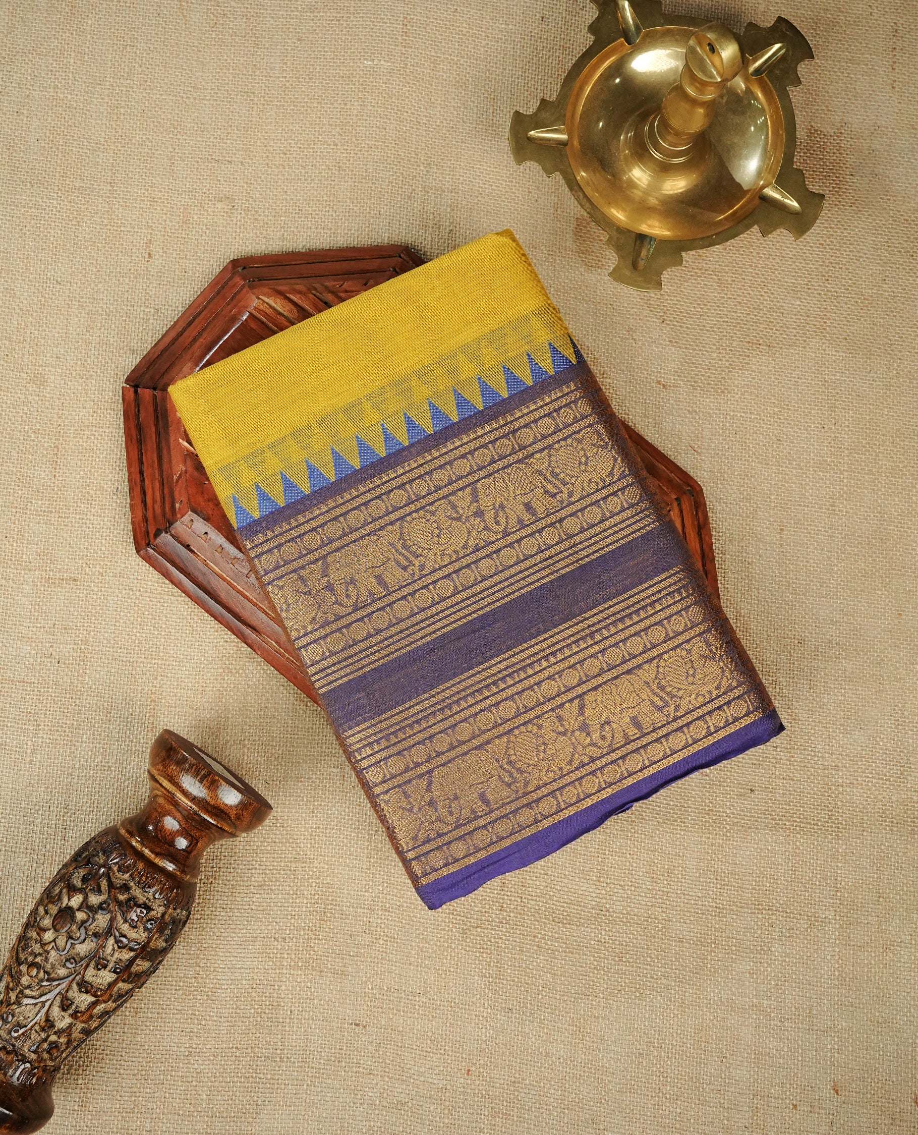 Lemon colour chettinad cotton saree featuring Elegant plain body, Contrast Blue colour with Gold zari border, comes with matching blouse piece.