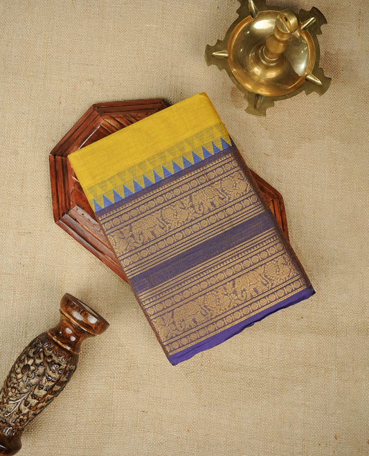 Lemon colour chettinad cotton saree featuring Elegant plain body, Contrast Blue colour with Gold zari border, comes with matching blouse piece.