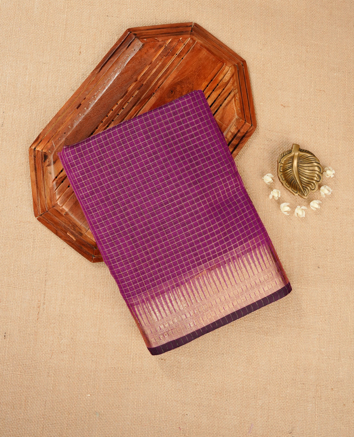 Grape colour Maheshwari cotton saree, gold zari small checks on body, complement self colour gold zari temple design border comes with matching blouse.