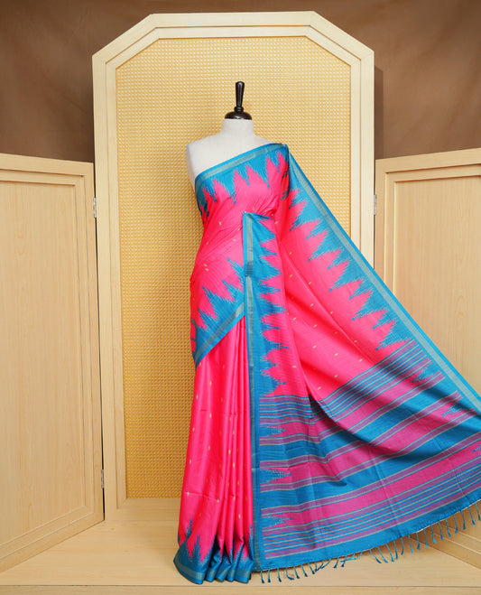 Rose Berry and Peacock Colour Kattan silk saree featuring buttas all over the body, a temple-designed border &  a contrasting striped pallu with tassels. Paired with a matching contrast-striped blouse piece.