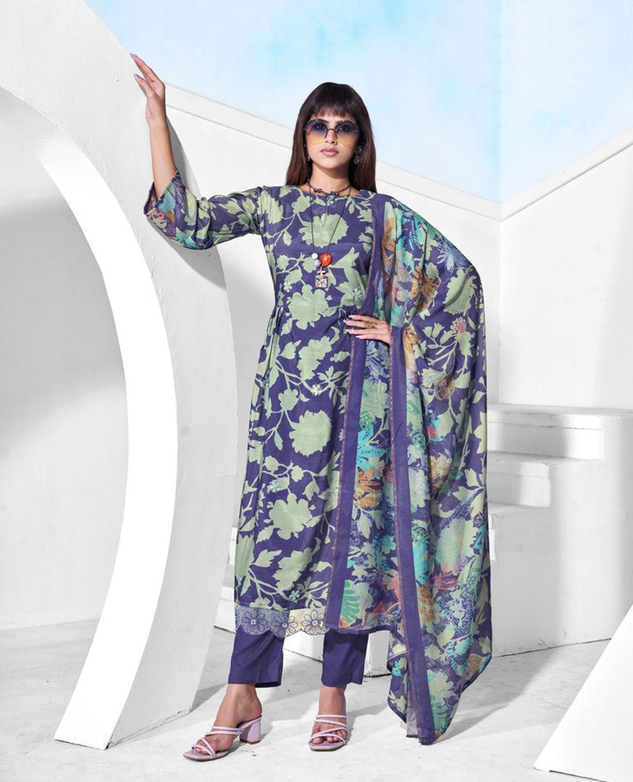 Navy blue colour pure muslin suit set featuring sage green digital floral printed top featuring sequin butti embroidery and a scalloped floral embroidered border, paired with a dyed pure viscose muslin bottom and a digital printed dupatta.
