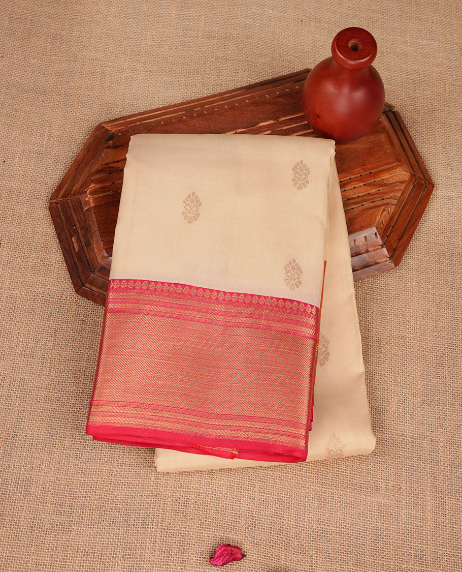 Beige colour Vasundhara silk saree featuring zari pattern on body, complemented by contrast Red with zari patterned border, and paired with matching blouse piece.