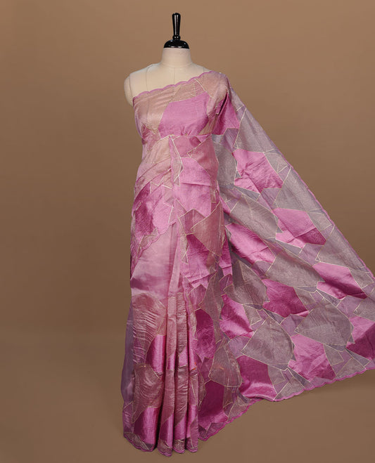 Pink colour Organza designer saree featuring a thread geometric pattern across the body, enhanced with a piping border and cut beats work on matching blouse piece.