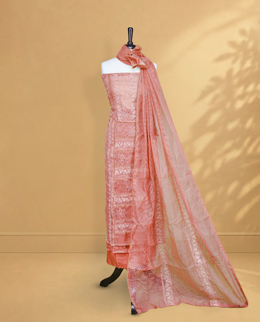Copper Rose colour Salwar material featuring Self colour Floral Thread pattern, Matching bottom and paired with Same colour with thread patterned Dupatta.
