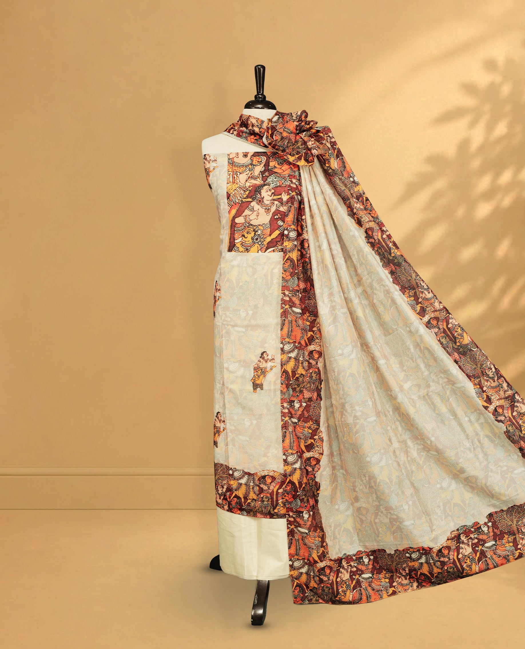 Cream colour salwar material Featuring Indian Art forms Print on body, paired with matching bottom & Elegant Dupatta.