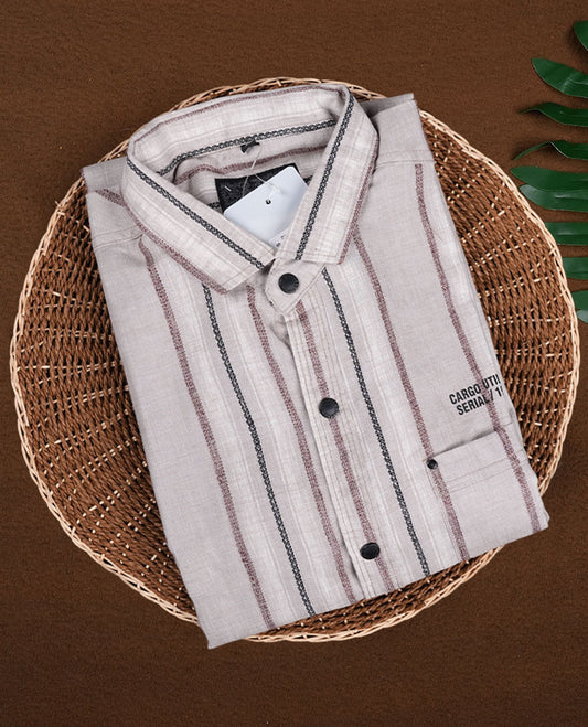 Beige colour shirt in breathable cotton fabric, featuring black and maroon vertical lines  & Designed with a classic collar, button front, and full sleeves, it combines casual ease with modern appeal.