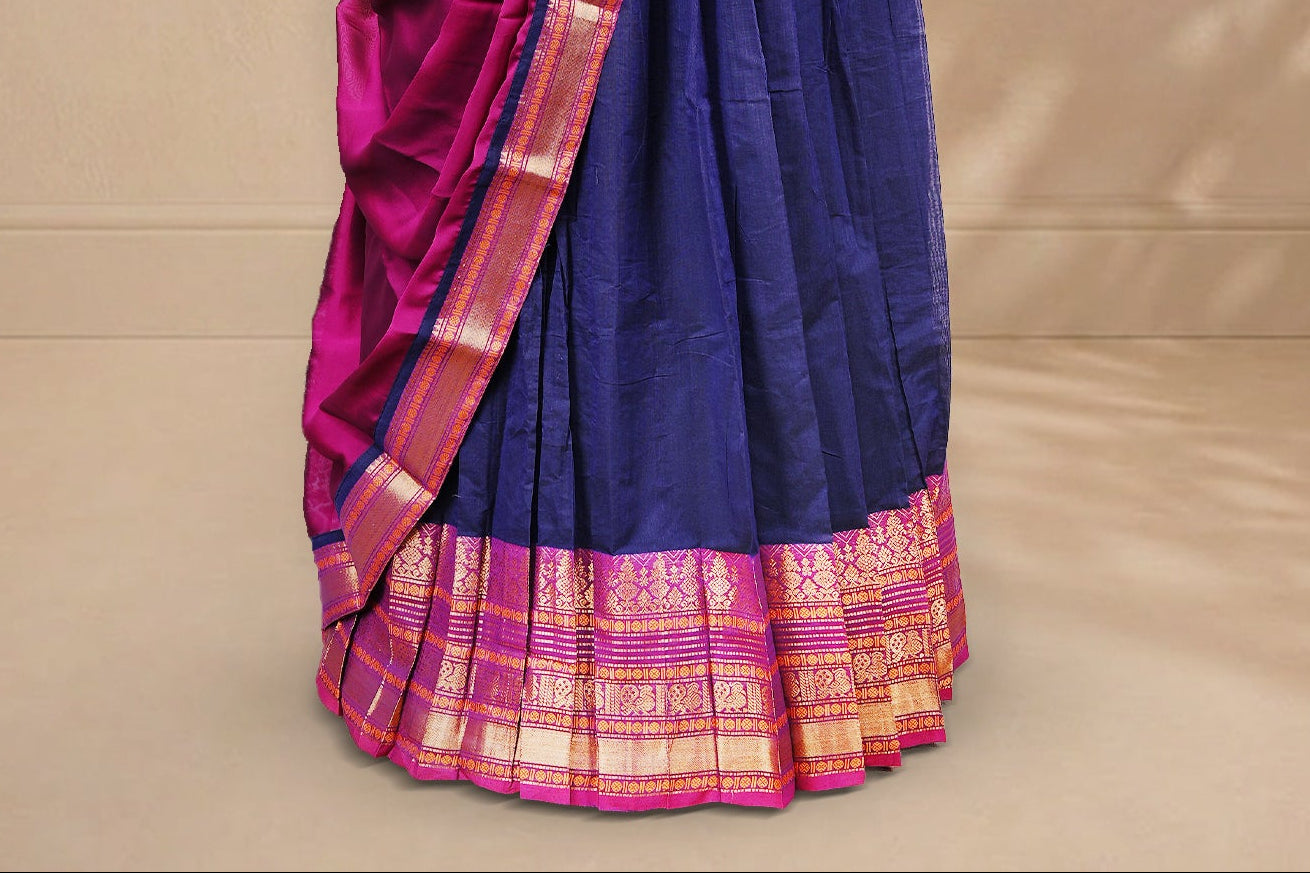 Navy Blue colour Half saree featuring Plain skirt with Zari border on contrast Magenta colour border, Unstitched Blouse and matching dupatta.