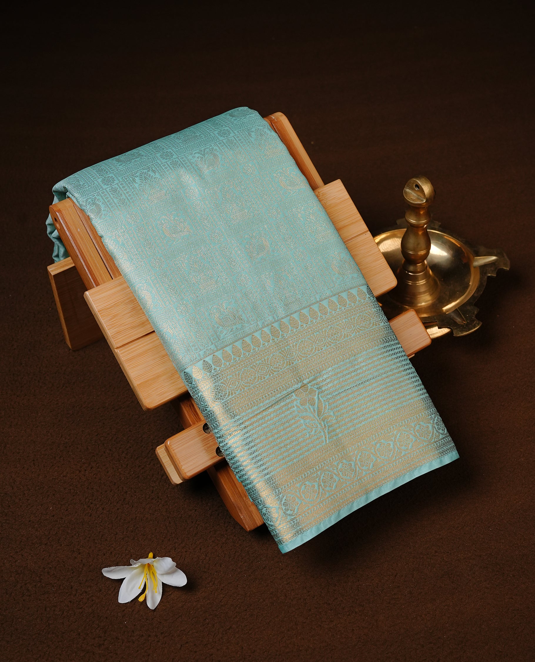 Aqua Colour Semi Wedding Silk Saree Featuring Gold Zari Checks With Buttas, Showcased with self colour With Traditional Border,  Paired With Matching Blouse Piece.