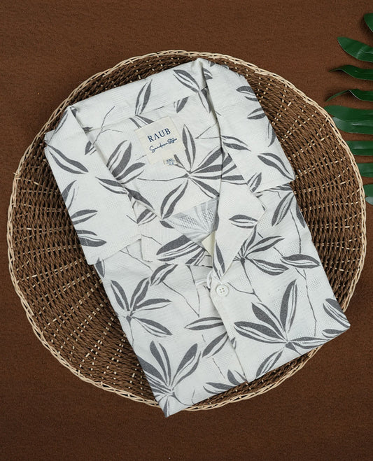 Off white colour short sleeve shirt features a rounded spread collar and a grey colour jacquard print all over & its ideal for both casual days and laid back evenings.